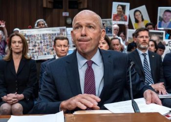 boeing's ceo is questioned about safety while the relatives of crash victims watch