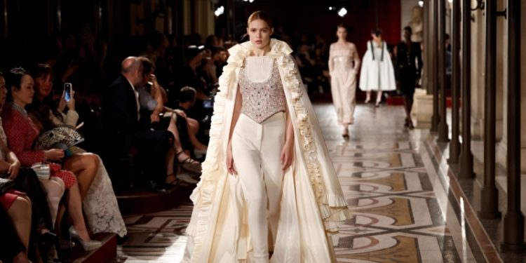 chanel visits the paris opera house with haute couture clothes.