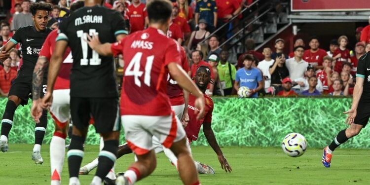 salah shines as liverpool give man utd early warning with preseason win