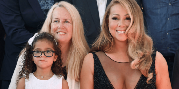 as mother and sister pass away on the same day, mariah carey weeps.
